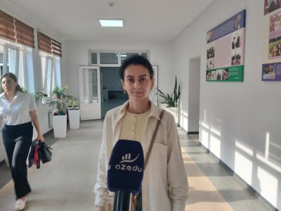 İki övladı ilə yanaşı hazırlaşdı, MİQ-də 90 bal qazandı