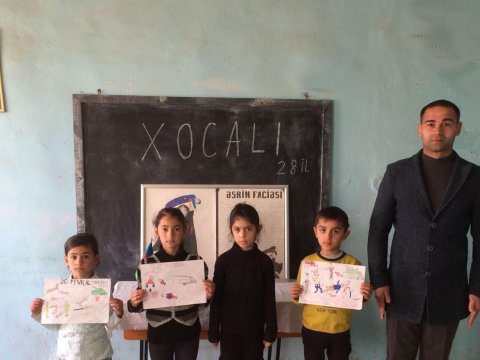 Məcburi köçkün məktəbində Xocalı harayı-FOTO