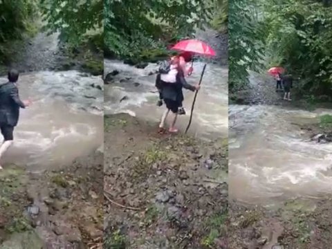 Azərbaycanda ata övladını məktəbə belində aparır - VİDEO  