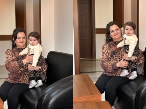 Tələbə imtahan verir, dekan isə onun körpəsini saxlayır 