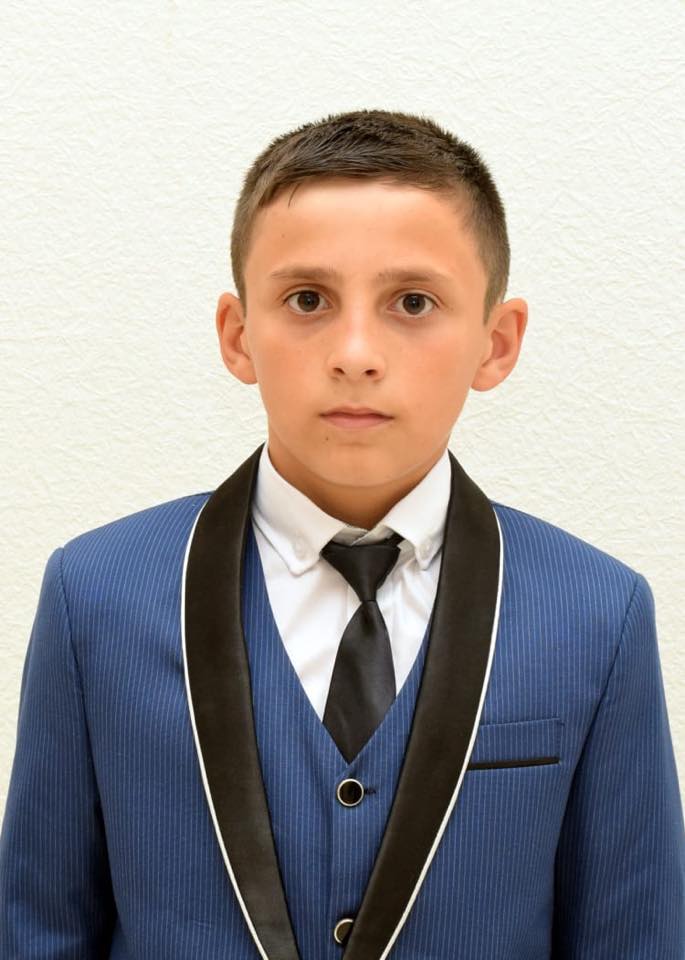 4 yaşlı qızı seldən xilas edən məktəbli mükafatlandırıldı-Foto