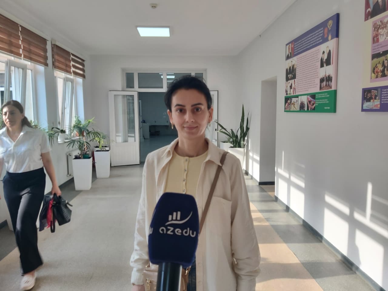 İki övladı ilə yanaşı hazırlaşdı, MİQ-də 90 bal qazandı